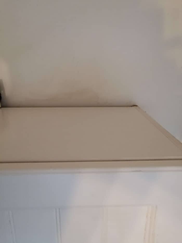 Bovenkant keukenkastjes schoonmaken